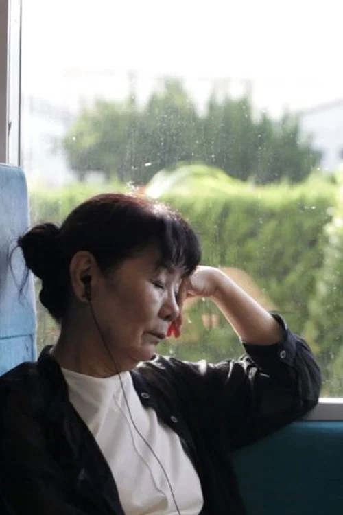 母との記録「働く手」 постер
